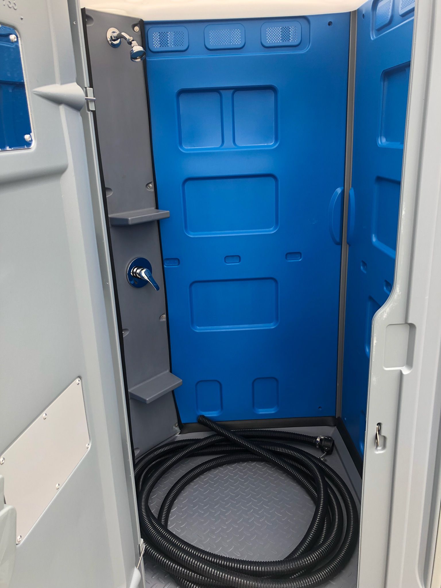 The inside of our portable showers